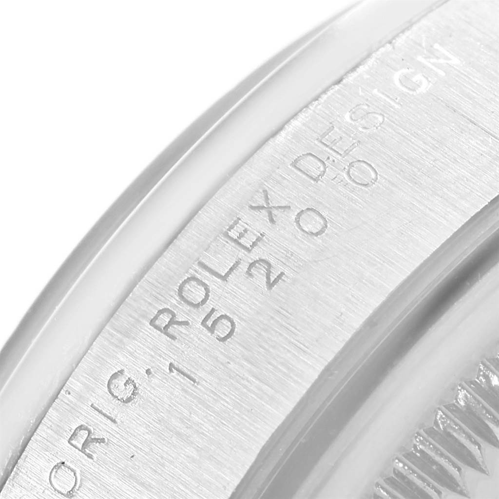 This close-up image shows the engraving on the case back of a Rolex Date 15200 Men's Stainless Steel White Dial 15200 Men's Stainless Steel White Dial model watch.