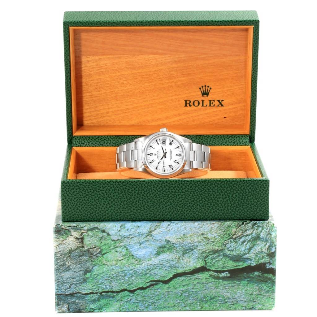 The image shows a Rolex Date 15200 Men's Stainless Steel White Dial 15200 Men's Stainless Steel White Dial model watch in a slightly open wooden Rolex box, captured from the front.