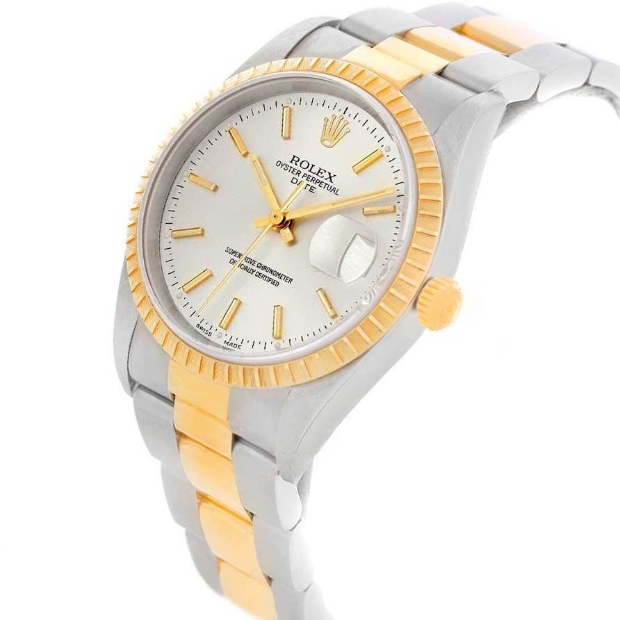 The image shows a Rolex Date 15223 Men's Steel and Gold (two tone) Silver Dial 15223 Men's Steel and Gold (two tone) Silver Dial model watch at a three-quarter angle, highlighting its face, crown, and two-tone bracelet.