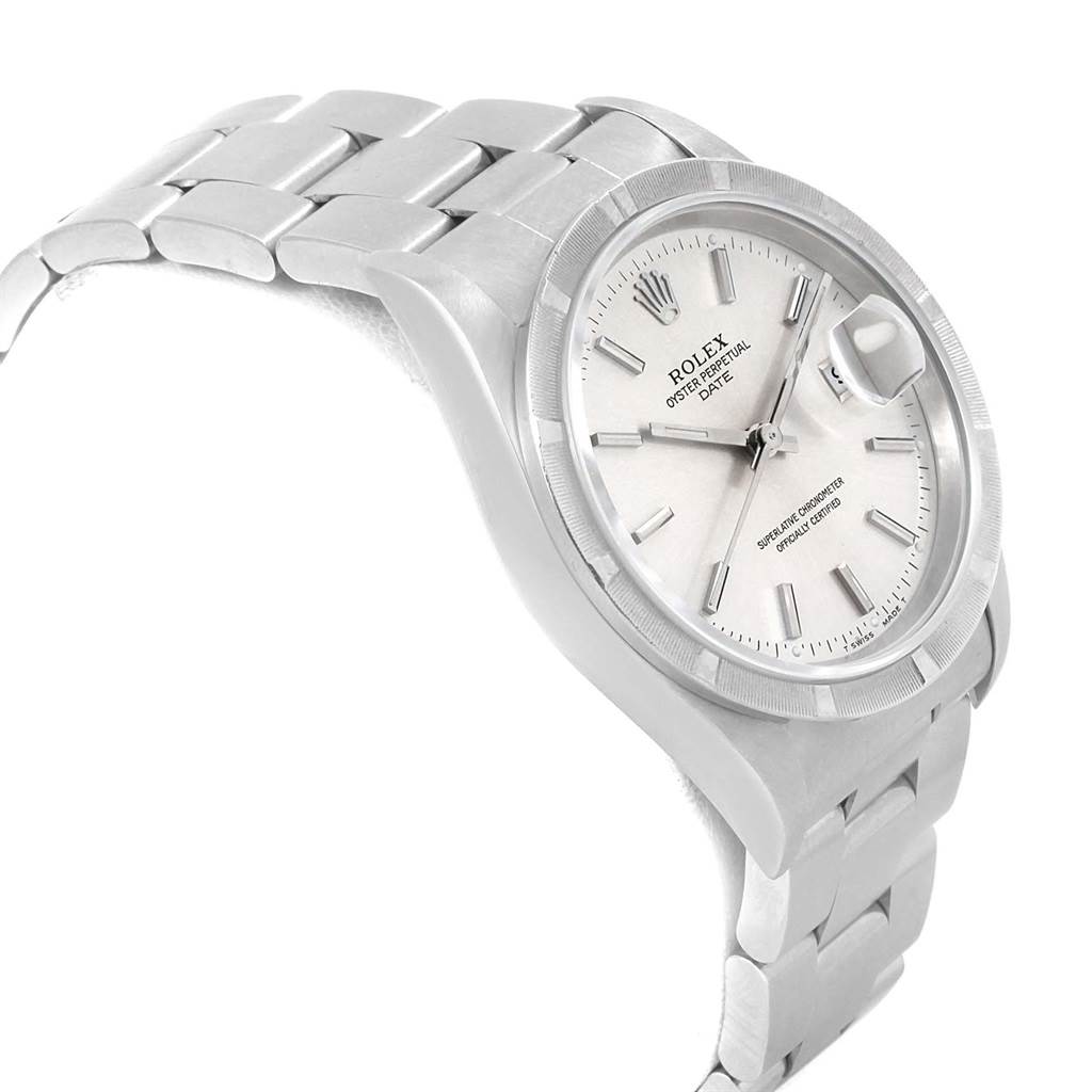 The image shows a Rolex Date 15210 Men's Stainless Steel Silver Dial 15210 Men's Stainless Steel Silver Dial model watch angled from the left, highlighting the face and part of the bracelet.