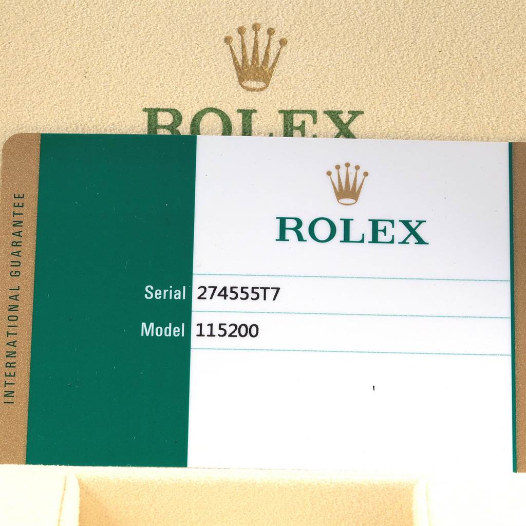 The image shows an International Guarantee card for a Rolex Date 115200 Men's Stainless Steel Silver Dial 115200 Men's Stainless Steel Silver Dial model 115200 with serial number 274555T7.
