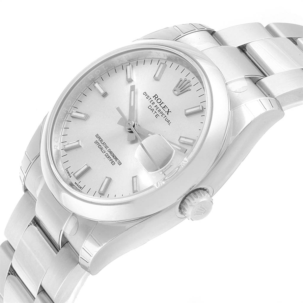The image shows a side angle of a Rolex Date 115200 Men's Stainless Steel Silver Dial 115200 Men's Stainless Steel Silver Dial model watch, highlighting the dial, bracelet, and crown.