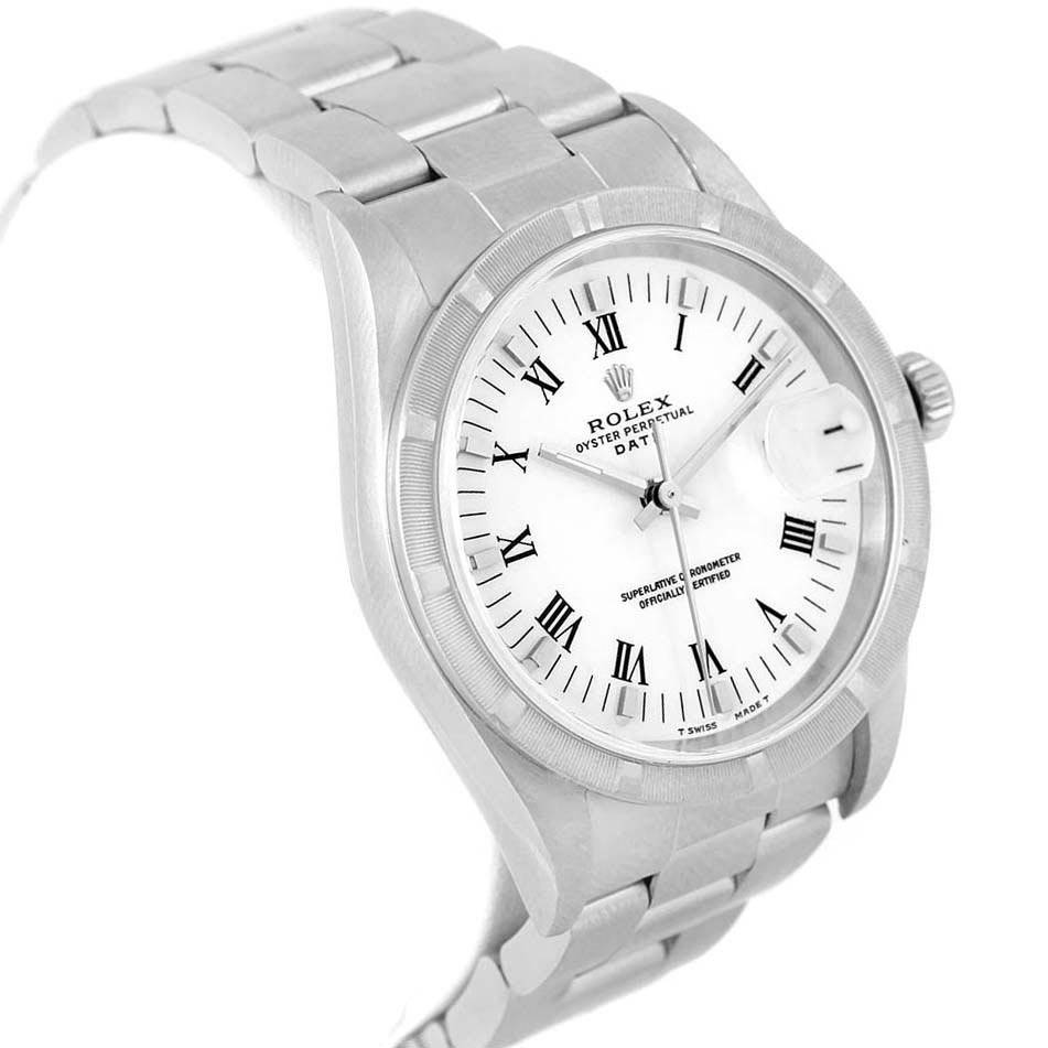 The image shows a Rolex Date 15210 Men's Stainless Steel White Dial 15210 Men's Stainless Steel White Dial model watch at an angled view, featuring the dial, bezel, and part of the bracelet.