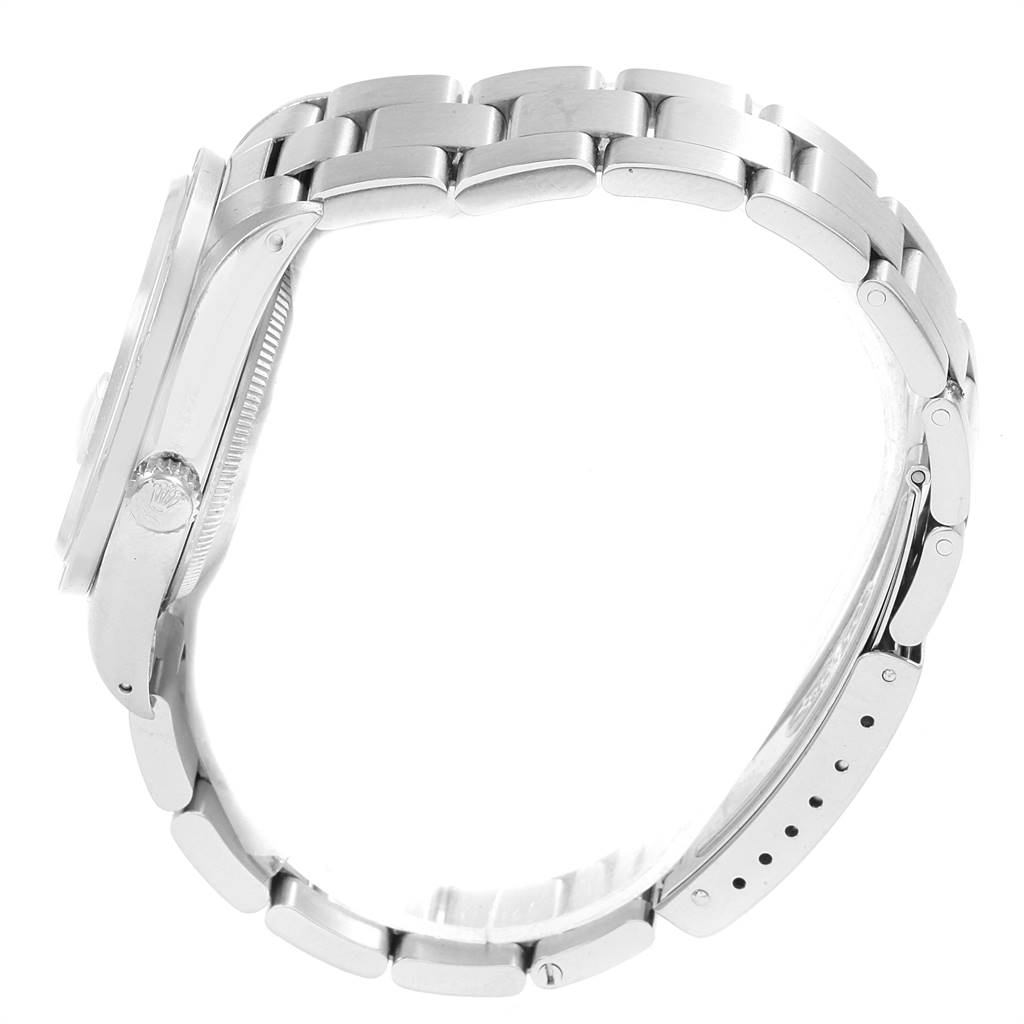 The image shows a Rolex Date 15210 Men's Stainless Steel White Dial 15210 Men's Stainless Steel White Dial model watch from the side, highlighting its bracelet and side profile of the case.