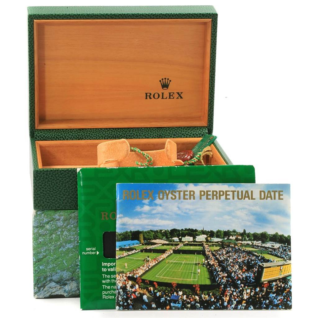 The image shows a Rolex Date 15200 Men's Stainless Steel White Dial 15200 Men's Stainless Steel White Dial model box, open with accessories inside, including a booklet and paperwork in front.