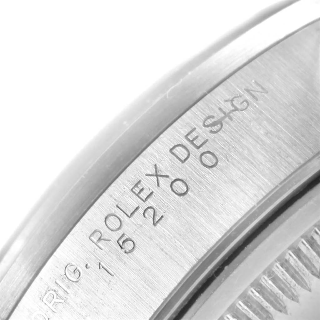 This image shows a close-up of the engraved case back of a Rolex Date 15200 Men's Stainless Steel White Dial 15200 Men's Stainless Steel White Dial model watch.