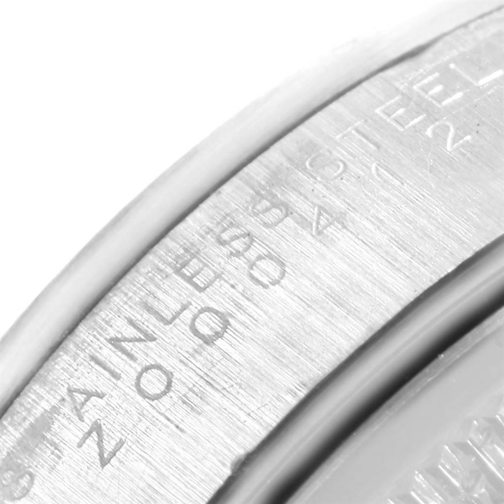 This image shows a close-up of the case back and inscriptions on a Rolex Date 15200 Men's Stainless Steel White Dial 15200 Men's Stainless Steel White Dial model watch.