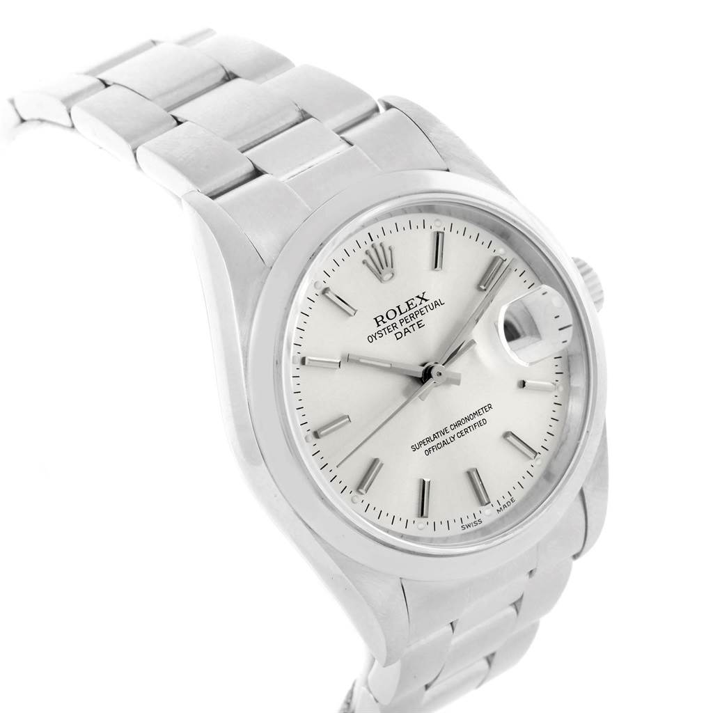 This Rolex Oyster Perpetual Date watch is shown at a slight angle, displaying its face, hands, date magnifier, and bracelet.