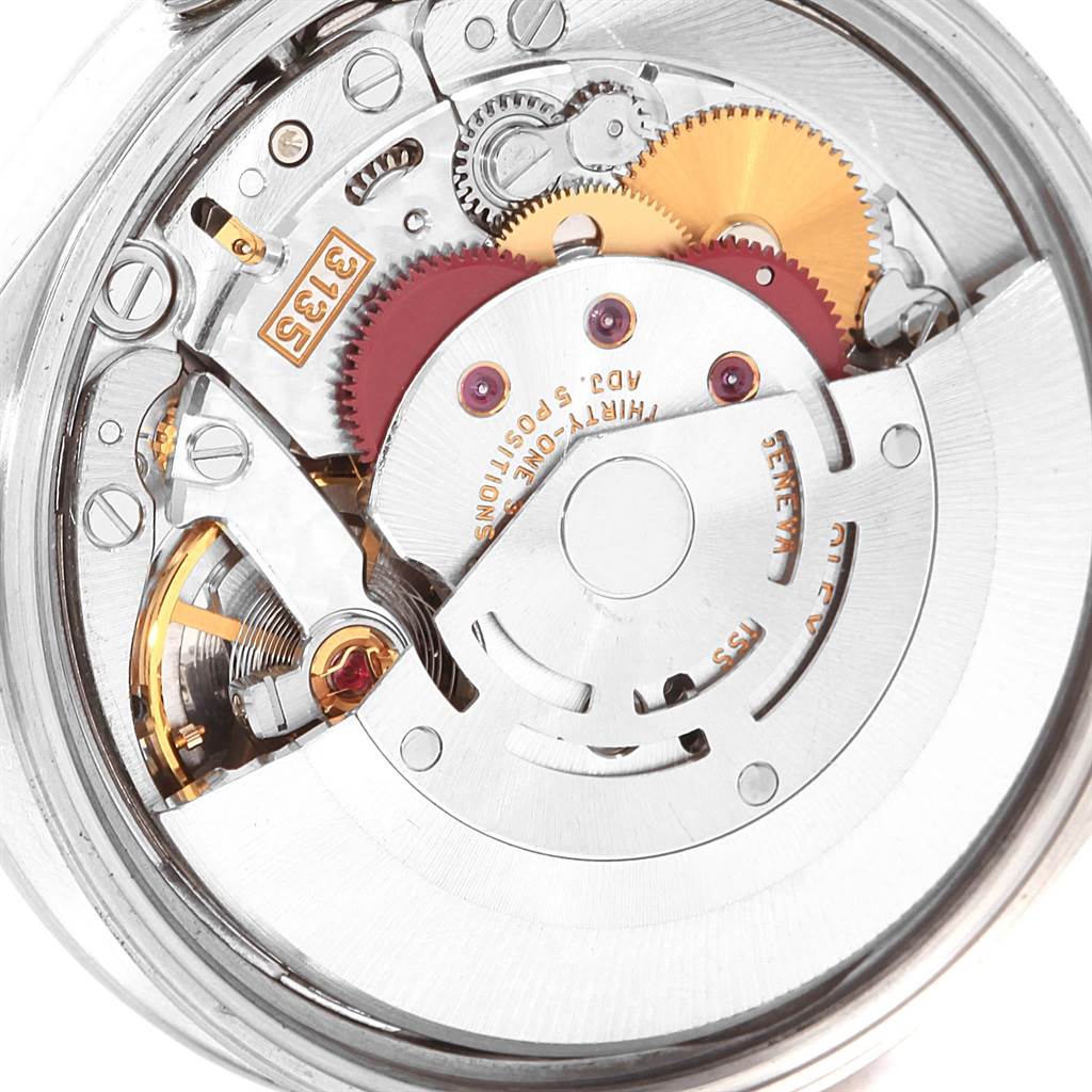 This image shows the inner mechanical movement of a Rolex Date 15200 Men's Stainless Steel Silver Dial 15200 Men's Stainless Steel Silver Dial model watch, highlighting the gears and rotor.