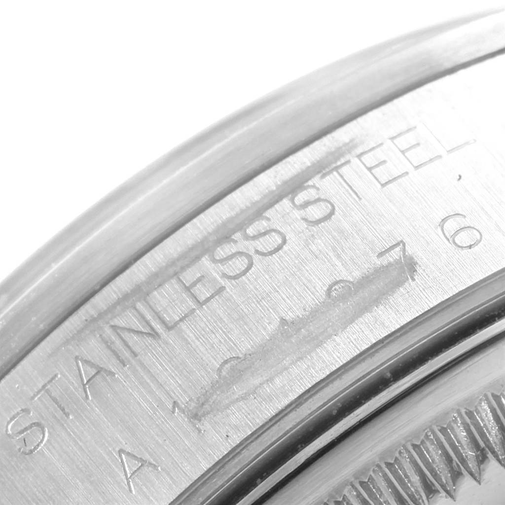 This close-up image shows the stainless steel casing and part of the bezel of a Rolex Date 15200 Men's Stainless Steel Silver Dial 15200 Men's Stainless Steel Silver Dial model watch.