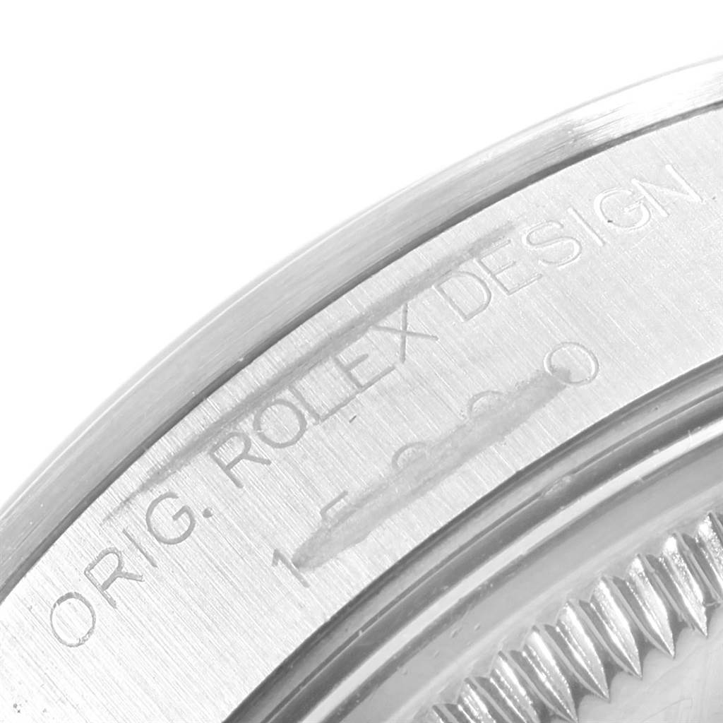 The image shows a close-up of the case back edge with the "ORIG. ROLEX DESIGN" engraving of a Rolex Date 15200 Men's Stainless Steel Silver Dial 15200 Men's Stainless Steel Silver Dial model watch.