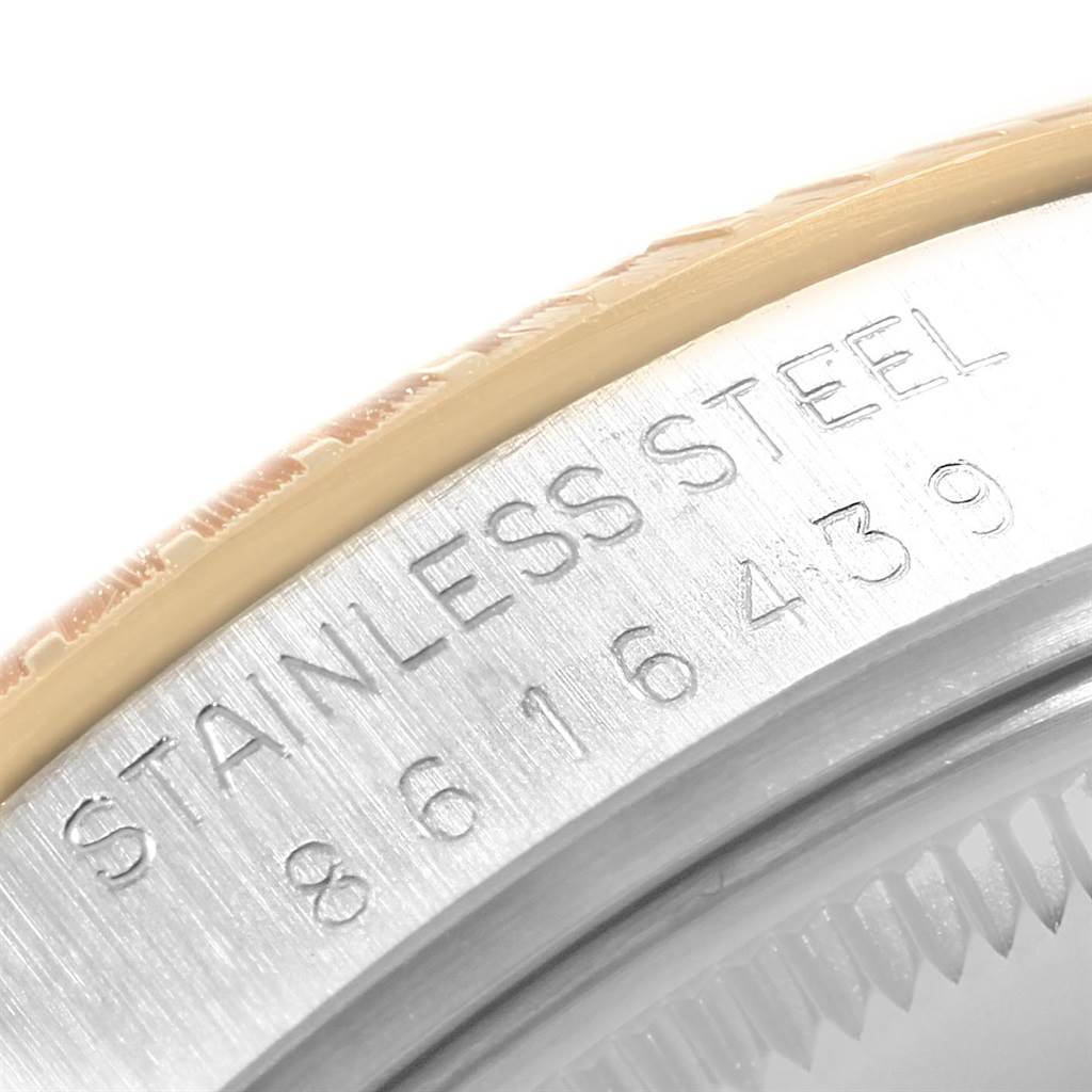 This is a close-up angle showing the stainless steel case back of a Rolex Date 15053 Men's Steel and Gold (two tone) White Dial 15053 Men's Steel and Gold (two tone) White Dial model watch, revealing part of the serial number.