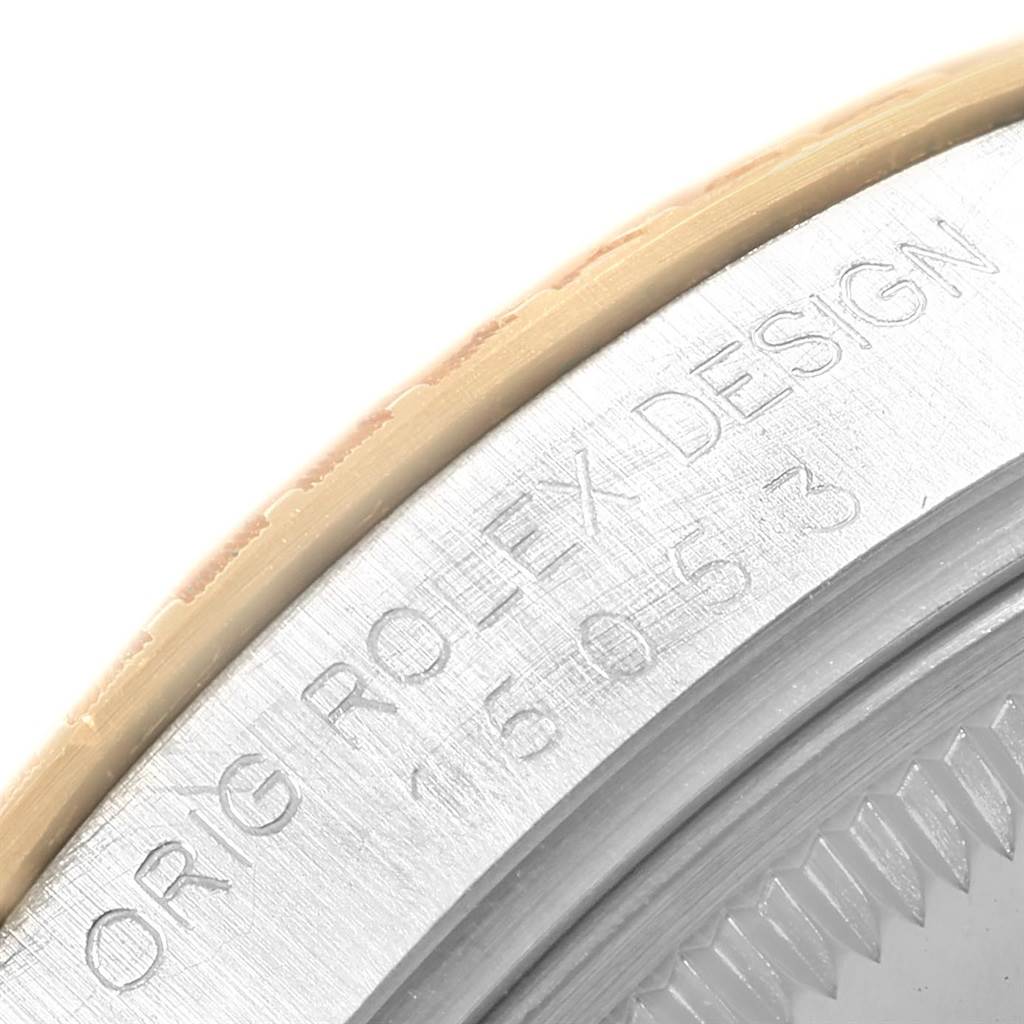 This image shows a close-up of the engraved case back edge of a Rolex Date 15053 Men's Steel and Gold (two tone) White Dial 15053 Men's Steel and Gold (two tone) White Dial model watch.