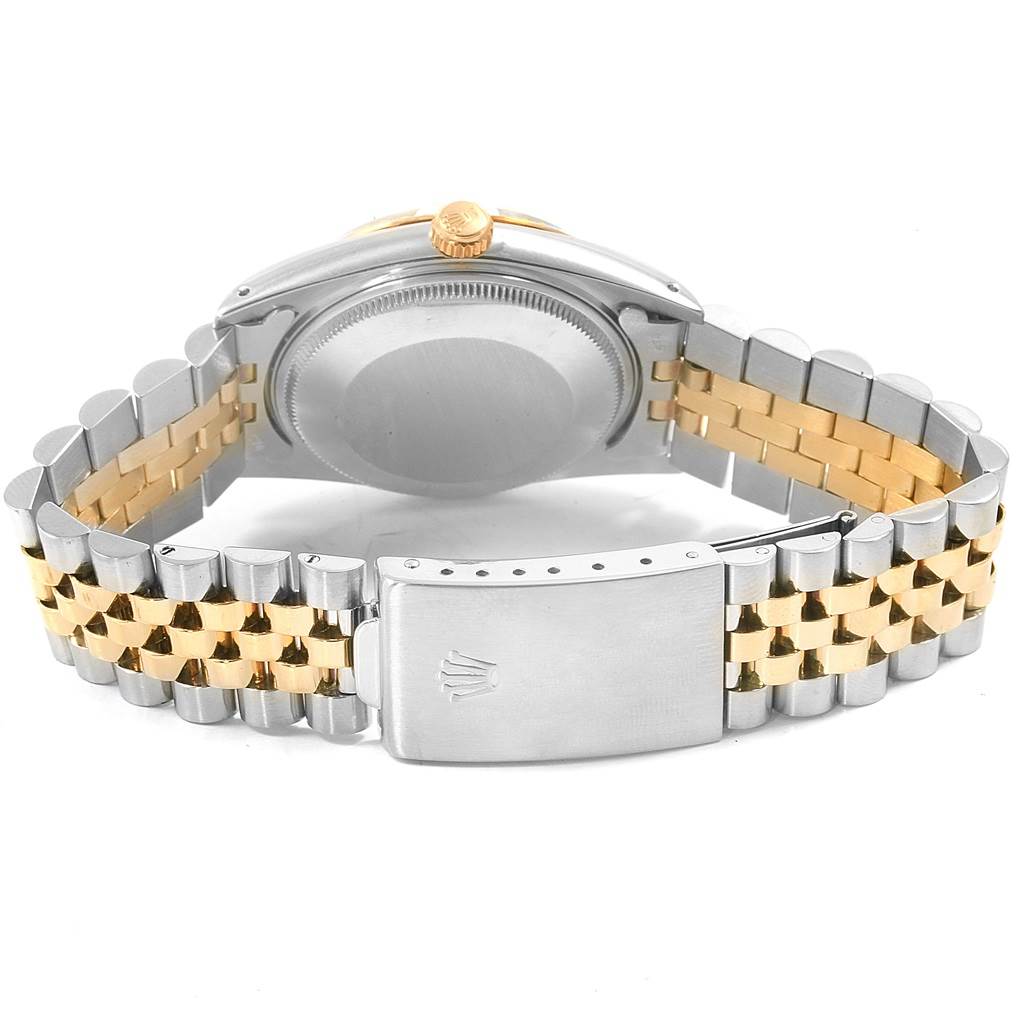 The image shows the back view of the Rolex Date 15053 Men's Steel and Gold (two tone) White Dial 15053 Men's Steel and Gold (two tone) White Dial model watch, highlighting its clasp and two-tone metal bracelet.