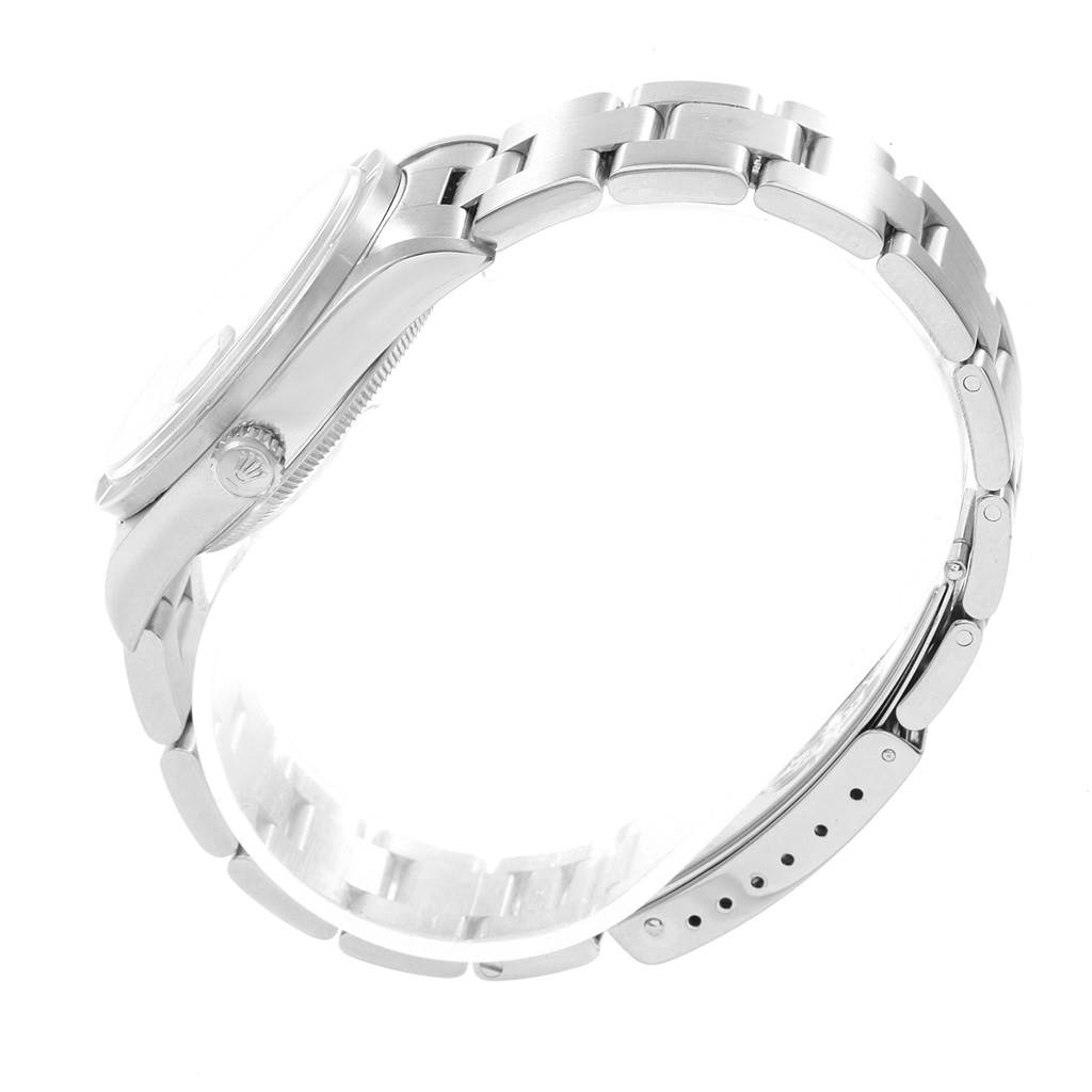 This side-angle view of the Rolex Date 15210 Men's Stainless Steel Black Dial 15210 Men's Stainless Steel Black Dial includes the case, crown, and bracelet.