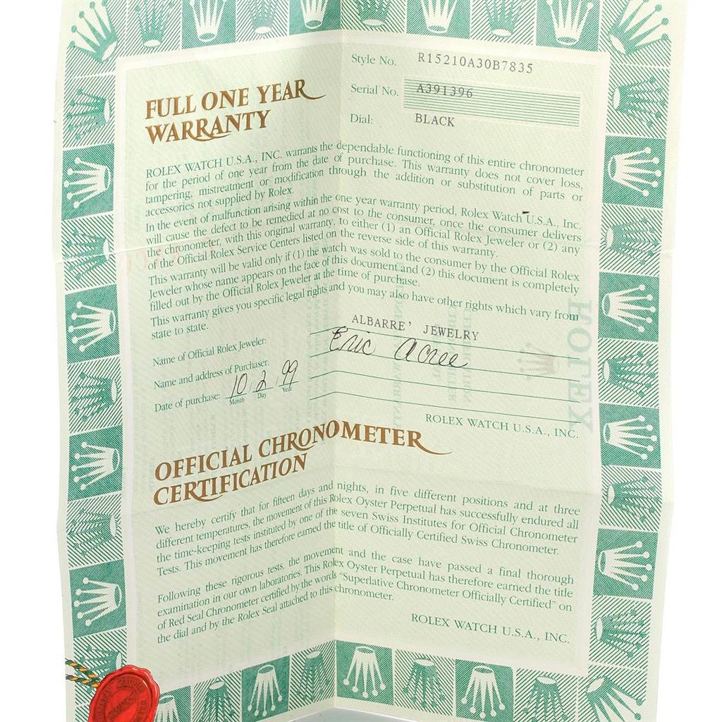 This image shows the warranty certificate for a Rolex Date 15210 Men's Stainless Steel Black Dial 15210 Men's Stainless Steel Black Dial model watch, with details on the watch’s style, serial number, and purchase information.