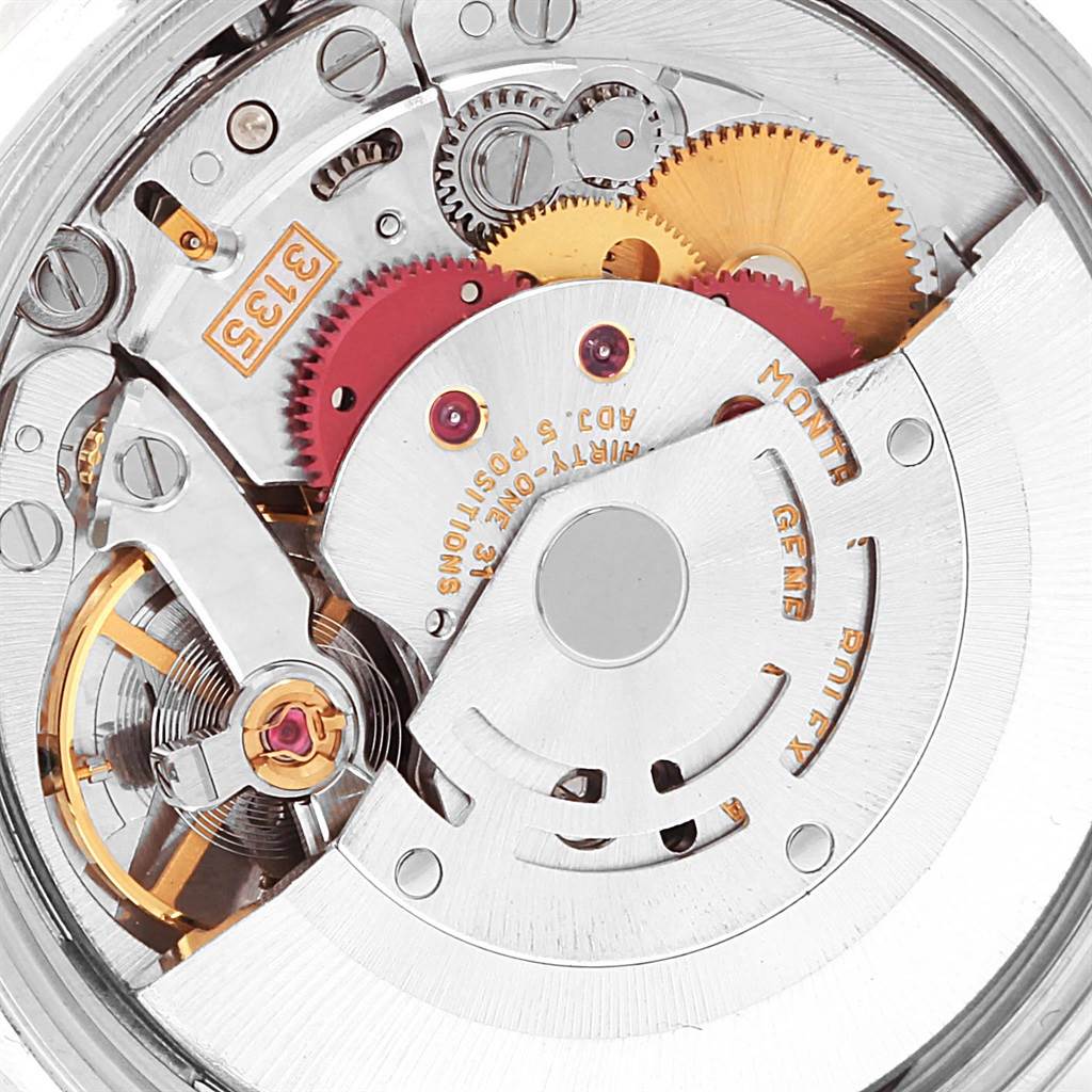 This image shows the intricate inner mechanics of the Rolex Date 15210 Men's Stainless Steel Black Dial 15210 Men's Stainless Steel Black Dial model watch from an open back angle.