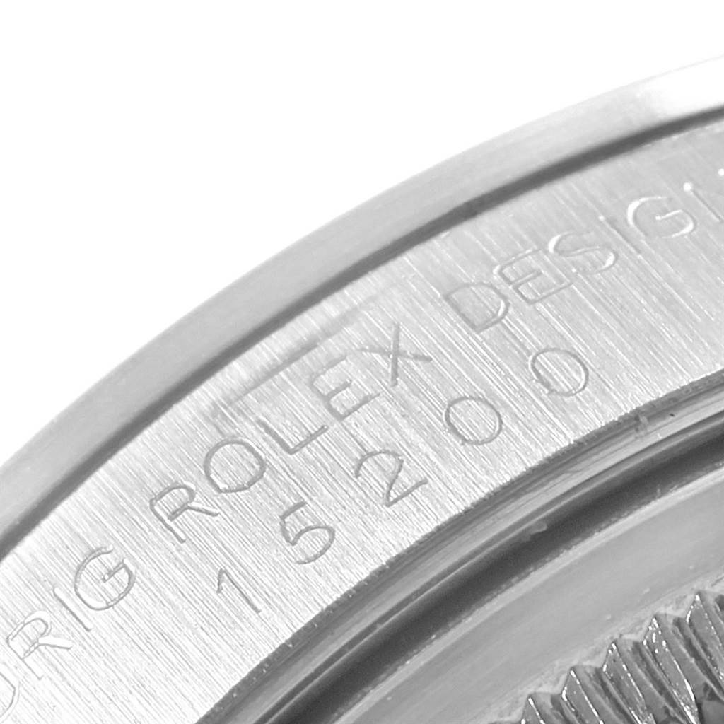 The image shows a close-up of the back case of a Rolex Date 15200 Men's Stainless Steel Black Dial 15200 Men's Stainless Steel Black Dial model watch, highlighting the engraved text and model number.