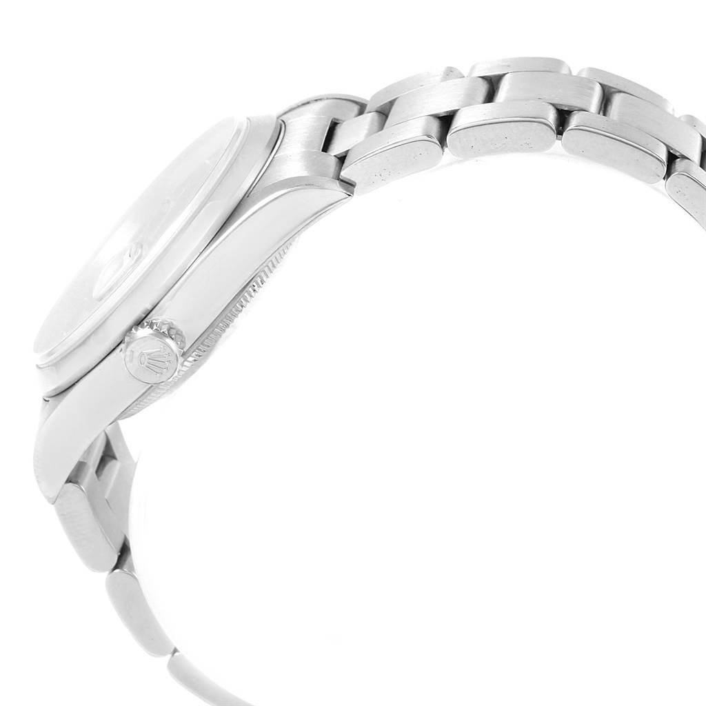 The image shows a side view of a Rolex Date 16200 Men's Stainless Steel Black Dial 16200 Men's Stainless Steel Black Dial model watch, highlighting the crown and part of the bracelet.