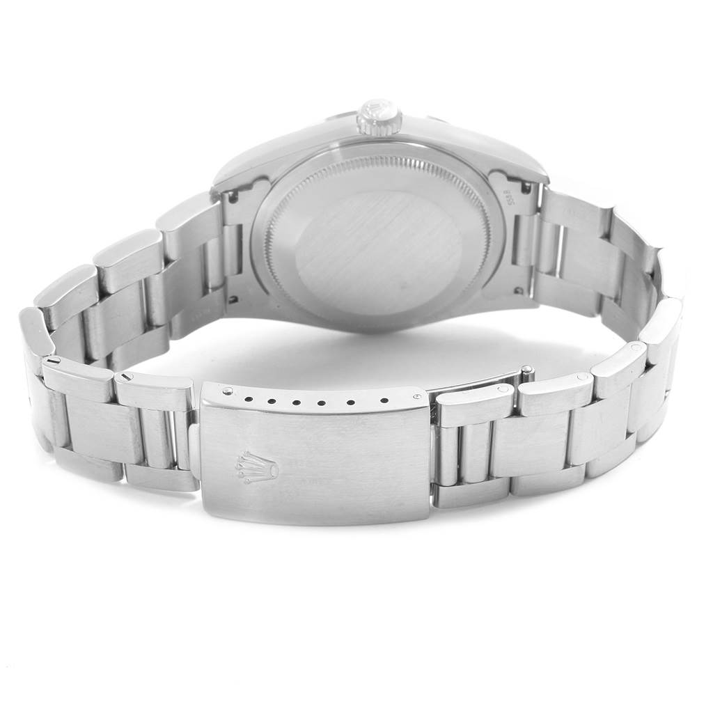 The image shows the back view of a Rolex Date 16200 Men's Stainless Steel Black Dial 16200 Men's Stainless Steel Black Dial watch, displaying its bracelet, clasp, and case back.