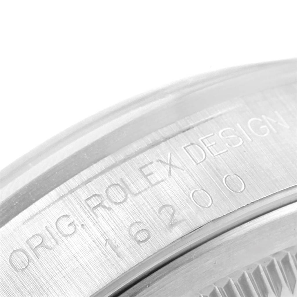 This image shows a close-up of the side engraved text on the band of a Rolex Date 16200 Men's Stainless Steel Black Dial 16200 Men's Stainless Steel Black Dial model watch.