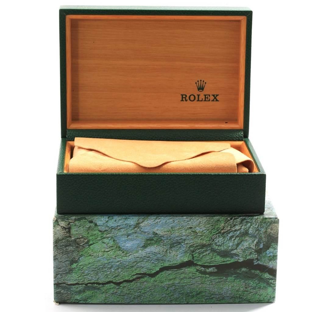 The image shows a Rolex Date 16200 Men's Stainless Steel Black Dial 16200 Men's Stainless Steel Black Dial model's open box from the front, displaying the interior with a tan protective cloth.