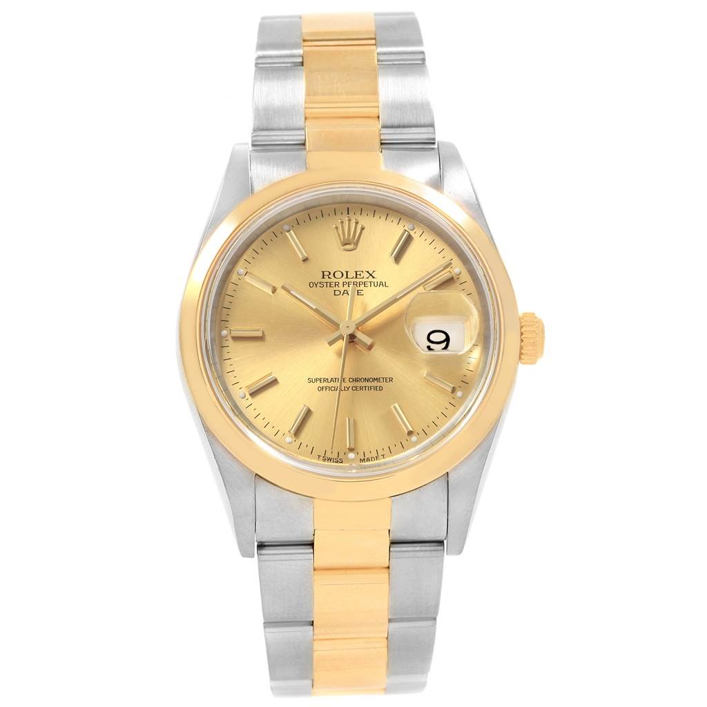 This image shows a front view of the Rolex Oyster Perpetual Date watch with a gold and silver bracelet.