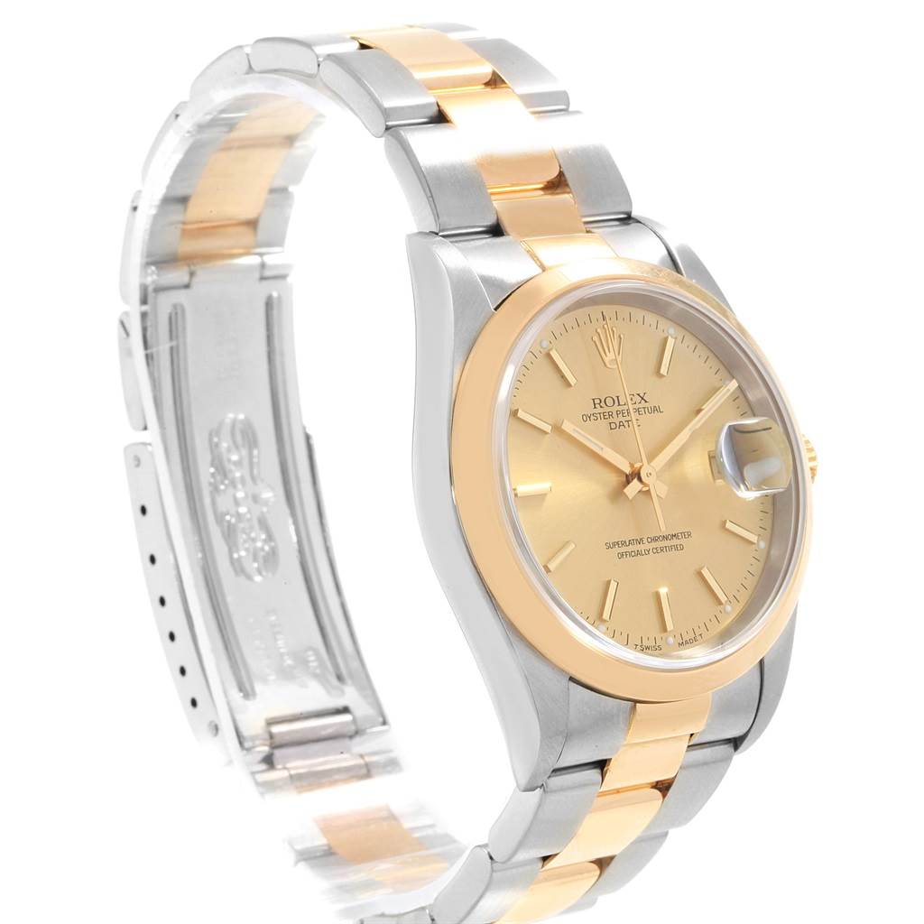 This is an angled view of a Rolex Date 15203 Men's Steel and Gold (two tone) Champagne Dial 15203 Men's Steel and Gold (two tone) Champagne Dial model showing the face, bezel, and two-tone bracelet.