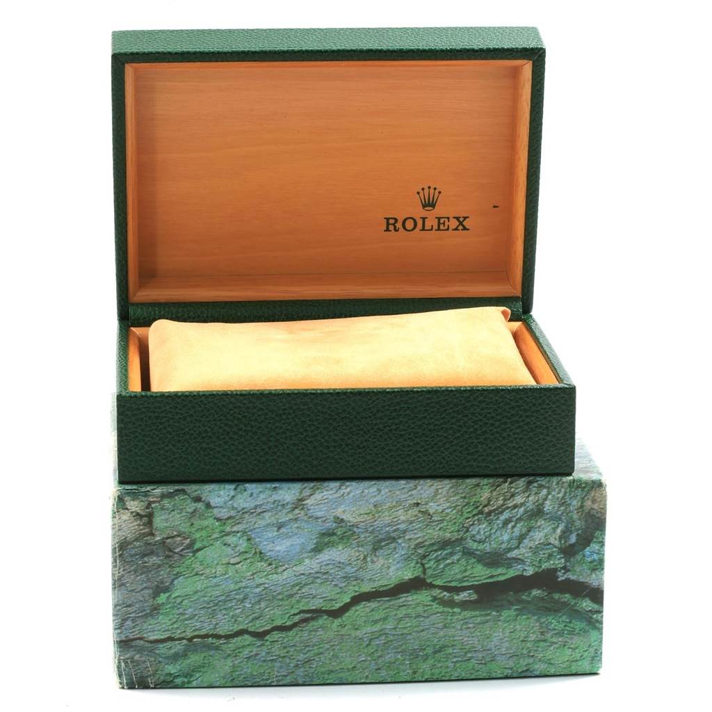 The image shows an open box with the logo for the Rolex Date 16220 Men's Stainless Steel Silver Dial 16220 Men's Stainless Steel Silver Dial model, including both the outer green box and inner wood finish.