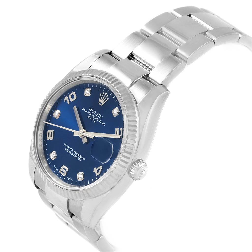 The image shows a Rolex Date 115234 Men's Stainless Steel Blue Dial 115234 Men's Stainless Steel Blue Dial model, captured at an angled side view highlighting the watch face, bezel, crown, and bracelet.