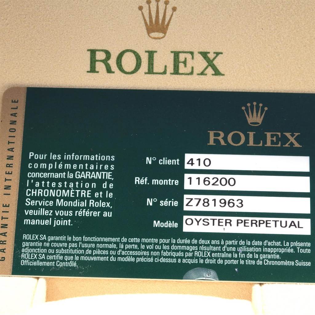The image shows a warranty card for a Rolex Date 116200 Men's Stainless Steel Black Dial 116200 Men's Stainless Steel Black Dial model watch, indicating the model as "116200" and bearing the Rolex logo.