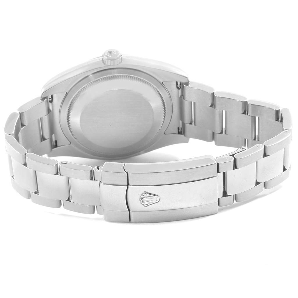 This image shows the back case and bracelet clasp of a Rolex Date 116200 Men's Stainless Steel Black Dial 116200 Men's Stainless Steel Black Dial model watch.