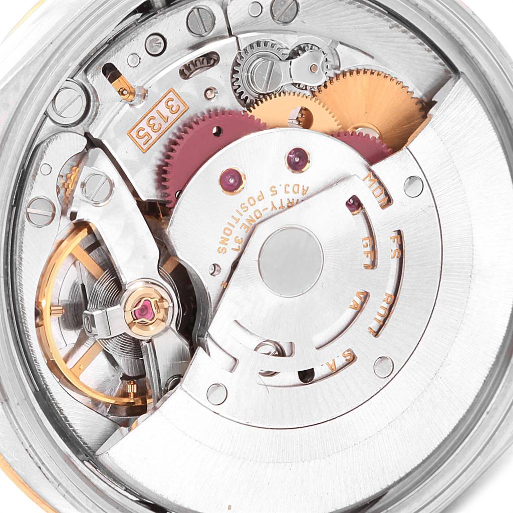 This close-up image shows the internal mechanisms of the Rolex Date 15223 Men's Steel and Gold (two tone) White Dial 15223 Men's Steel and Gold (two tone) White Dial model watch.