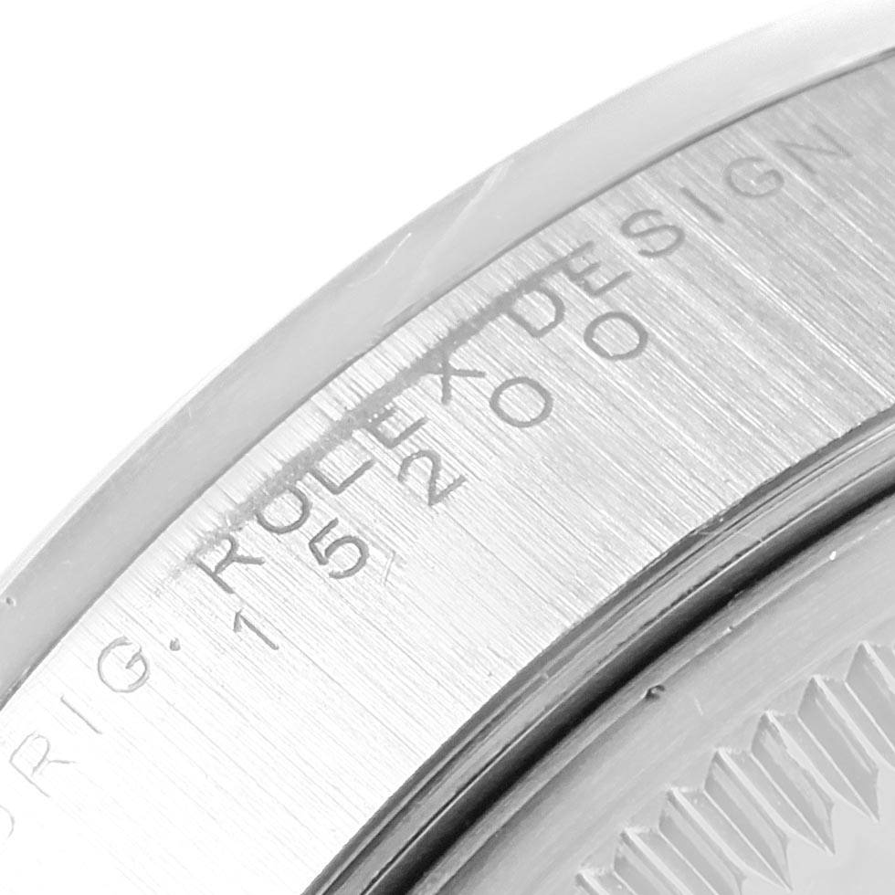 This image shows a close-up of the engraving on the bezel of a Rolex Date 15200 Men's Stainless Steel Silver Dial 15200 Men's Stainless Steel Silver Dial model watch.