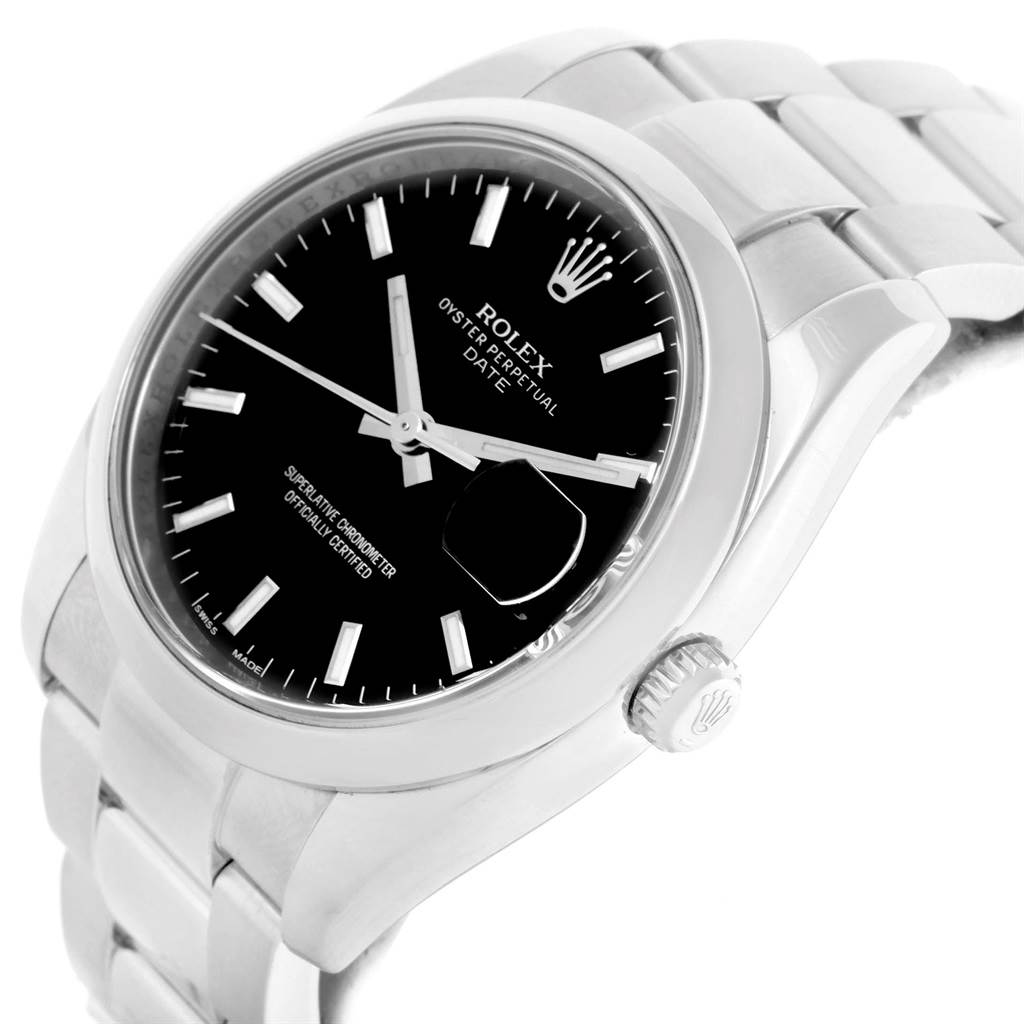 The image shows a Rolex Date 115200 Men's Stainless Steel Black Dial 115200 Men's Stainless Steel Black Dial model watch at a slight side angle, highlighting the dial, bezel, crown, and part of the bracelet.
