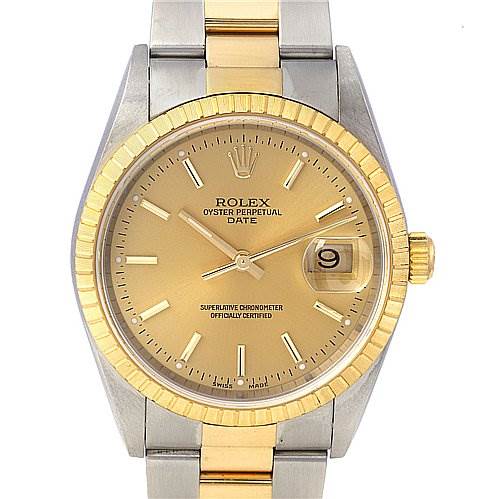 The Rolex Oyster Perpetual Date watch is shown from a front angle, displaying the gold dial, fluted bezel, and part of the two-tone bracelet.