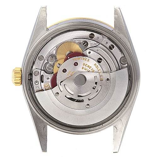 This image displays the back angle of a Rolex Date 15223 Men's Stainless Steel Champagne Dial 15223 Men's Stainless Steel Champagne Dial model watch, showing its internal mechanical movement.