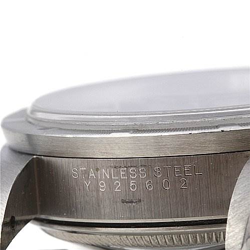 This image shows the case side and serial number of a Rolex Date 15210 Men's Stainless Steel Black Dial 15210 Men's Stainless Steel Black Dial watch, highlighting the stainless steel material.