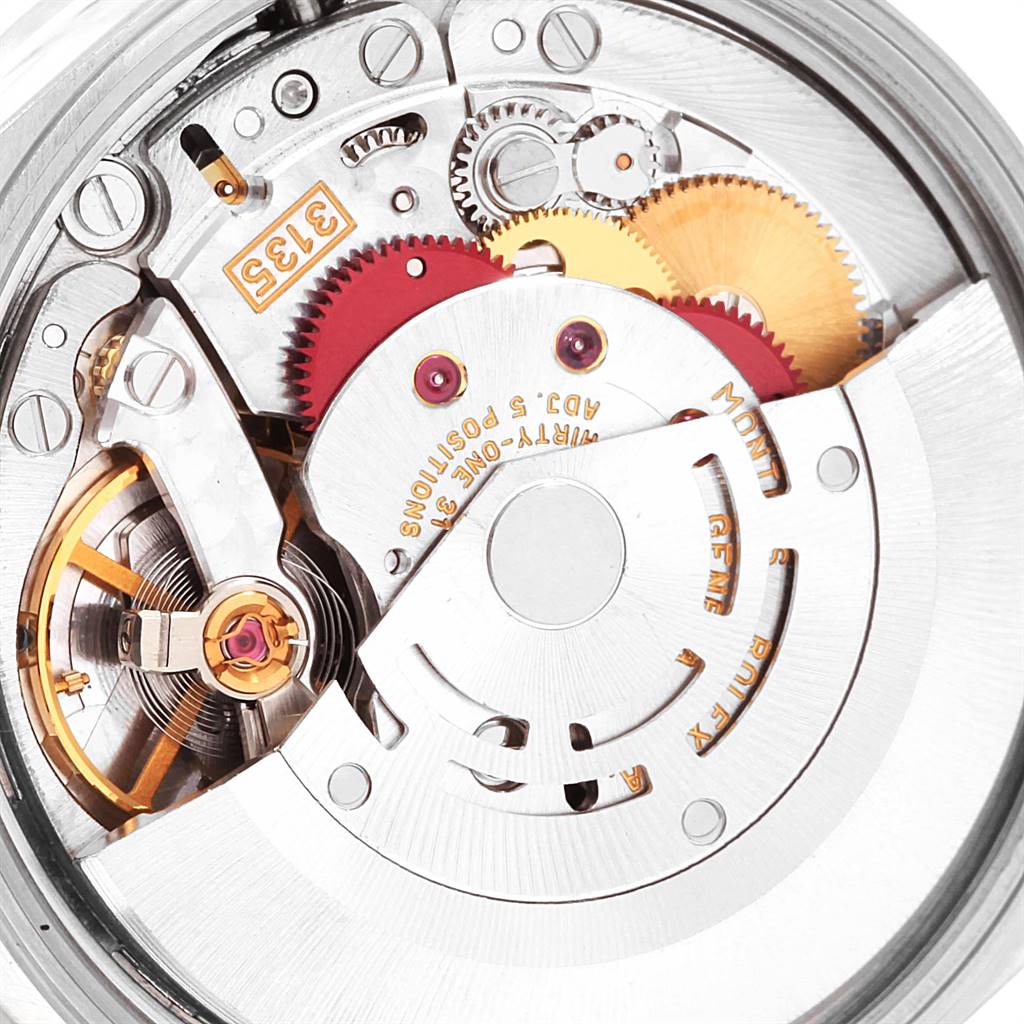 This image shows a close-up of the movement and internal components of a Rolex Date 15210 Men's Stainless Steel Silver Dial 15210 Men's Stainless Steel Silver Dial model watch.