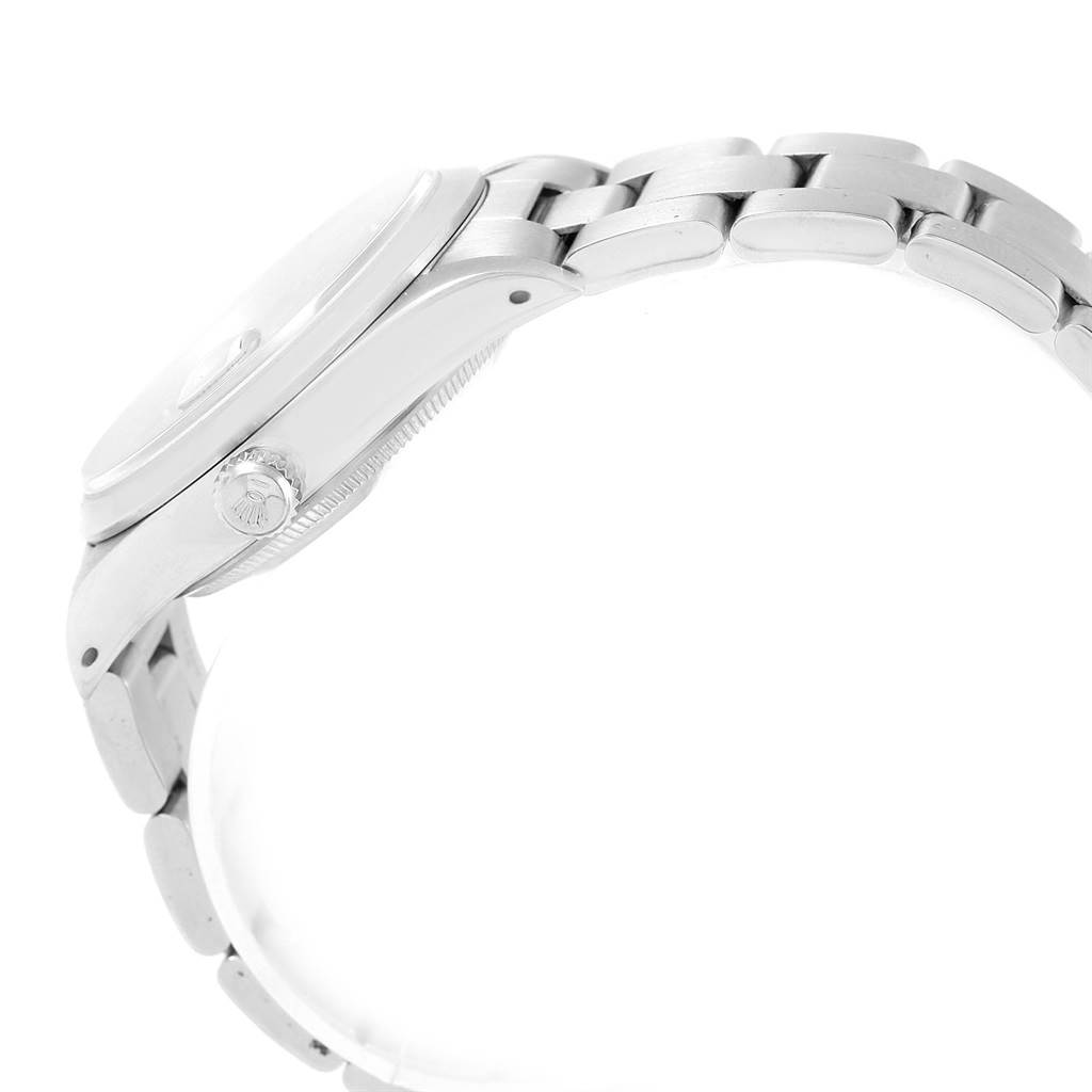 The image shows the side profile of a Rolex Date 15200 Men's Stainless Steel Black Dial 15200 Men's Stainless Steel Black Dial model, focusing on the crown and part of the bracelet.