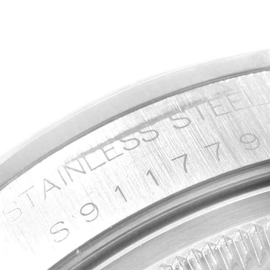 The image shows the engravings on the stainless steel case back of the Rolex Date 15200 Men's Stainless Steel Black Dial 15200 Men's Stainless Steel Black Dial model watch.