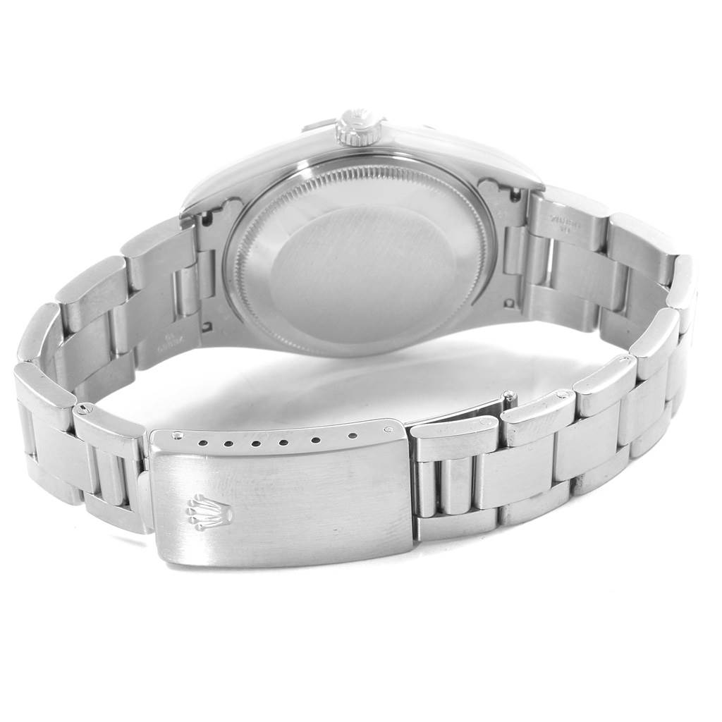 The image shows the back case and bracelet of a Rolex Date 15200 Men's Stainless Steel Black Dial 15200 Men's Stainless Steel Black Dial model watch, viewed from an angled rear perspective.