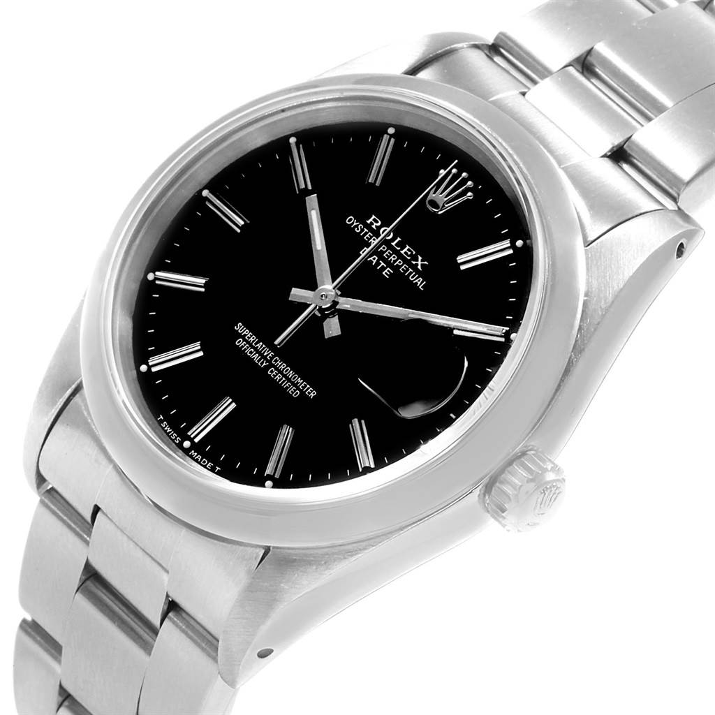 The image shows a Rolex Date 15200 Men's Stainless Steel Black Dial 15200 Men's Stainless Steel Black Dial model watch at an angled top-down view, highlighting its black dial, crown, and stainless steel bracelet.