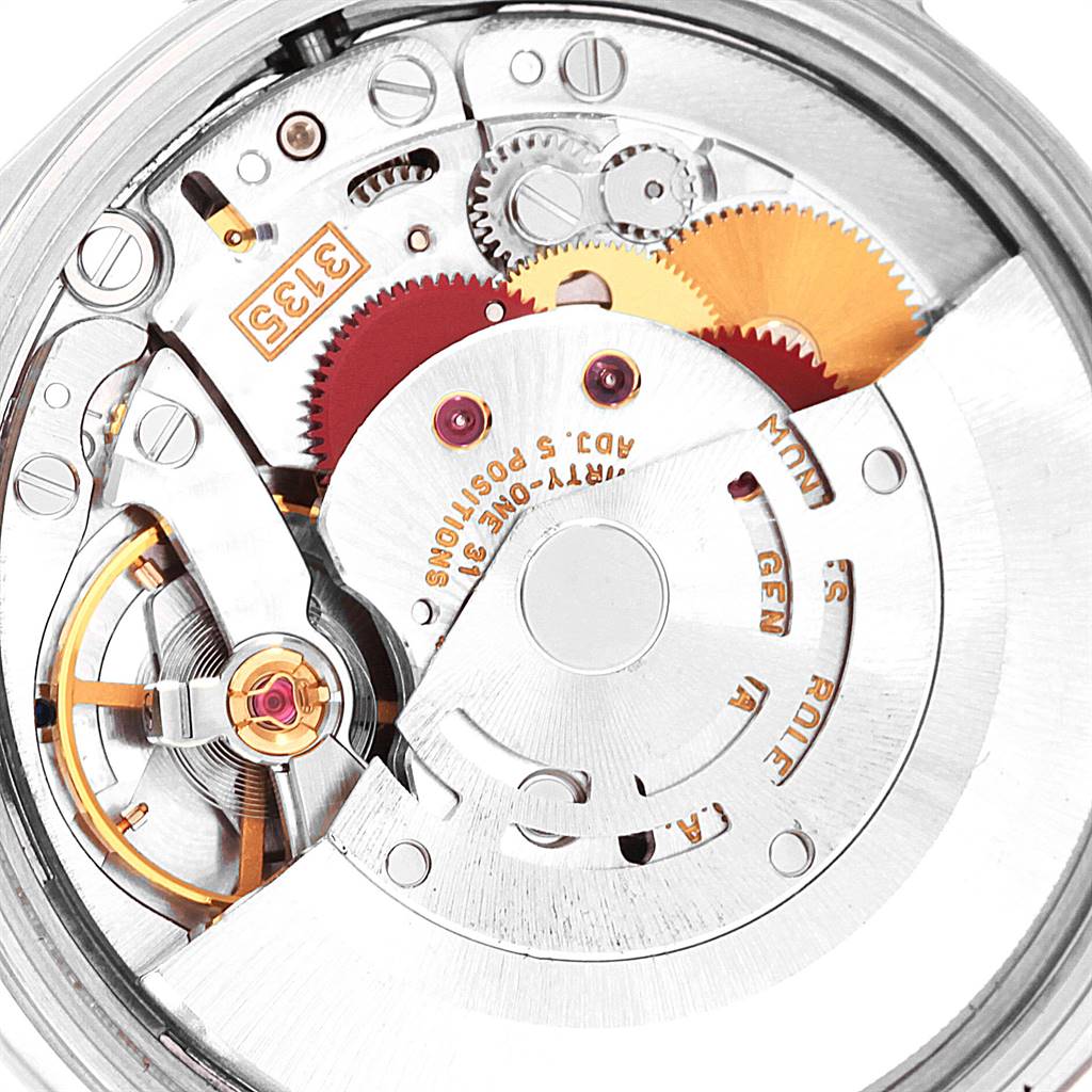 The image shows the internal mechanism of a Rolex Date 15200 Men's Stainless Steel Black Dial 15200 Men's Stainless Steel Black Dial model watch, focusing on the movement and gears.