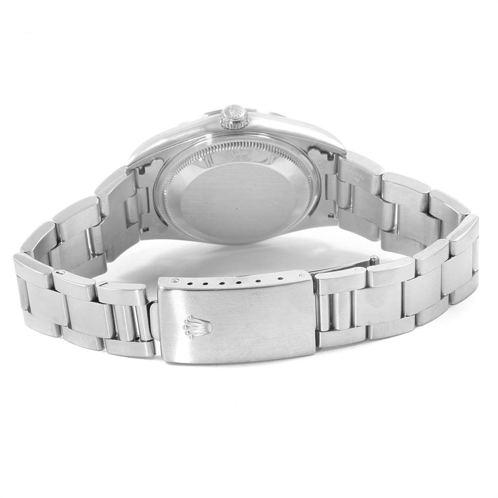 The image shows the back view and clasp of a Rolex Date 15200 Men's Stainless Steel Black Dial 15200 Men's Stainless Steel Black Dial model, focusing on the case back and stainless steel bracelet.