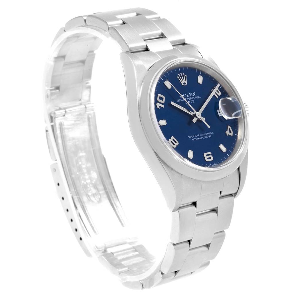 The image shows a 3/4 side angle of a Rolex Date 15200 Men's Stainless Steel Blue Dial 15200 Men's Stainless Steel Blue Dial model watch, highlighting its blue dial, metal bracelet, and date magnifier.