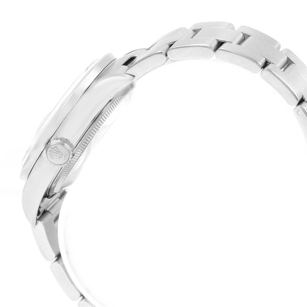 This image shows a side view of a Rolex Date 15210 Men's Stainless Steel Blue Dial 15210 Men's Stainless Steel Blue Dial model watch, highlighting the crown and part of the bracelet.