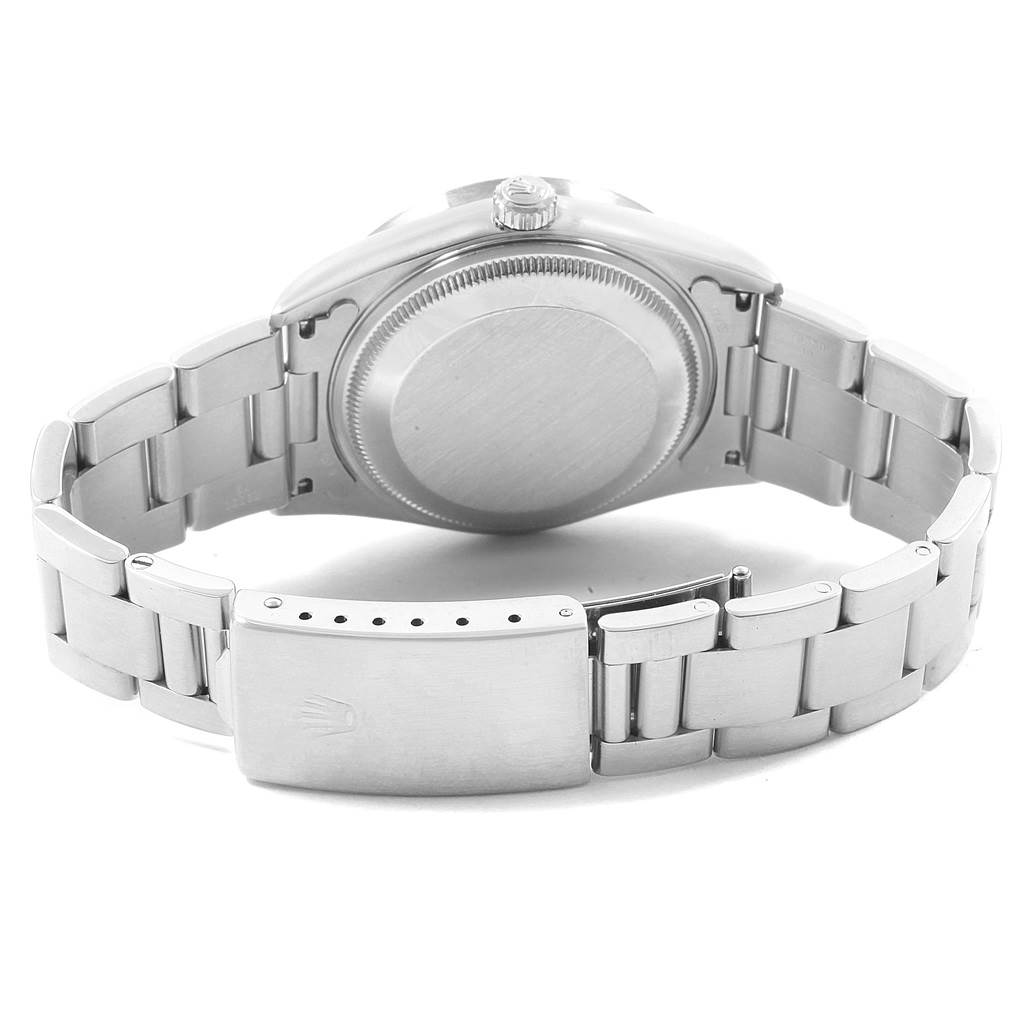 The image shows the back case and bracelet of a Rolex Date 15210 Men's Stainless Steel Blue Dial 15210 Men's Stainless Steel Blue Dial model watch.