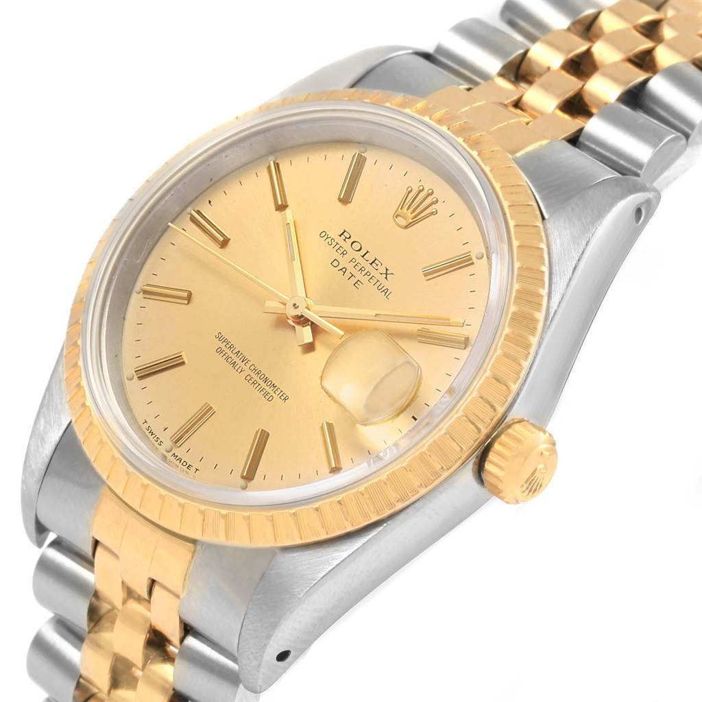 The image shows a Rolex Date 15223 Men's Steel and Gold (two tone) Champagne Dial 15223 Men's Steel and Gold (two tone) Champagne Dial model watch from a three-quarter angle, highlighting the dial, bezel, crown, and bracelet.