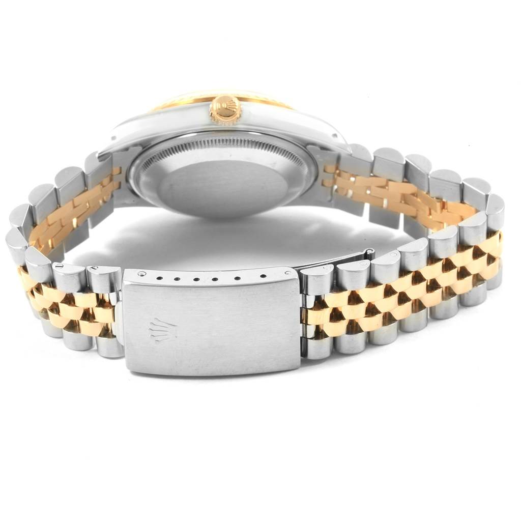 The image shows the back of the Rolex Date 15223 Men's Steel and Gold (two tone) Champagne Dial 15223 Men's Steel and Gold (two tone) Champagne Dial watch, focusing on the case back, crown, and two-tone jubilee bracelet with the clasp prominently displayed.